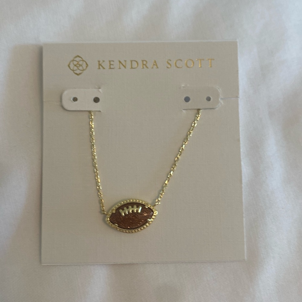 Kendra Scott Gold-tone Football Pendant Necklace with Brown Center